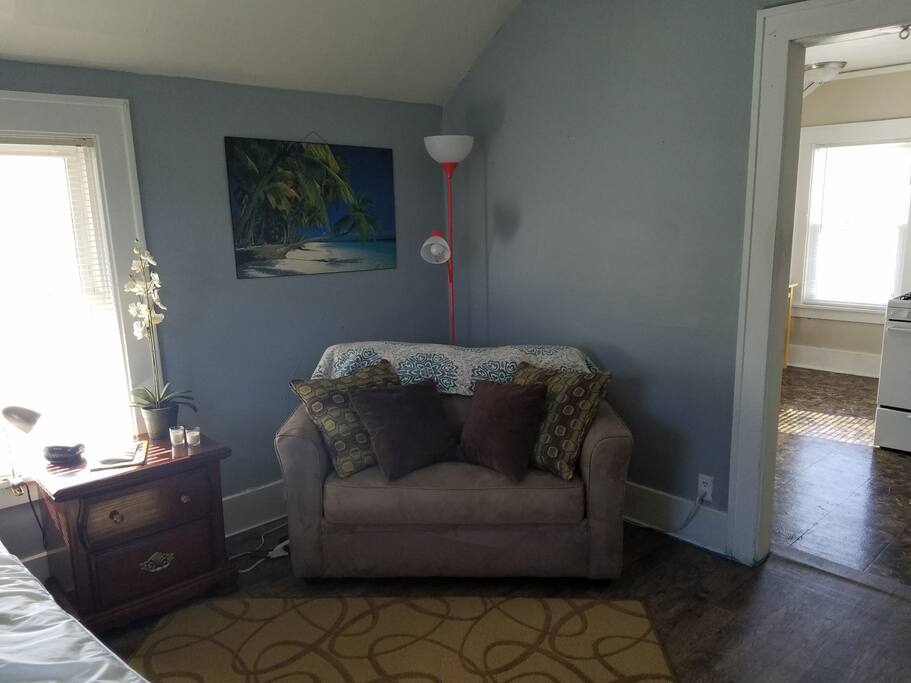 Loveseat with a twin sized hide-a-bed.