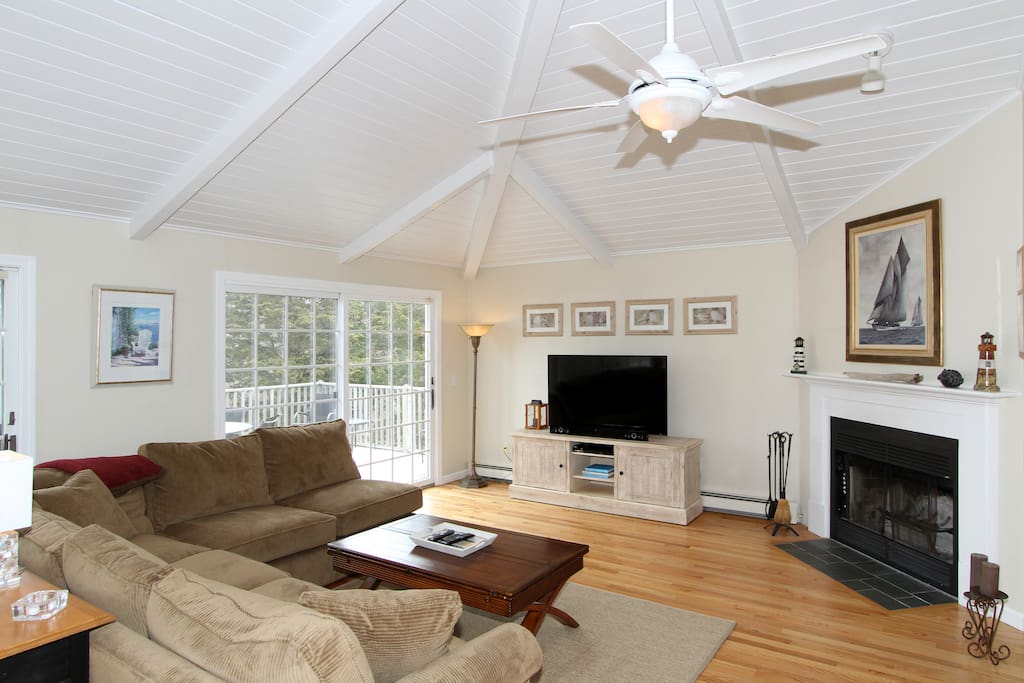 Six can gather around the fireplace and 55" flat-screen TV in the living area.