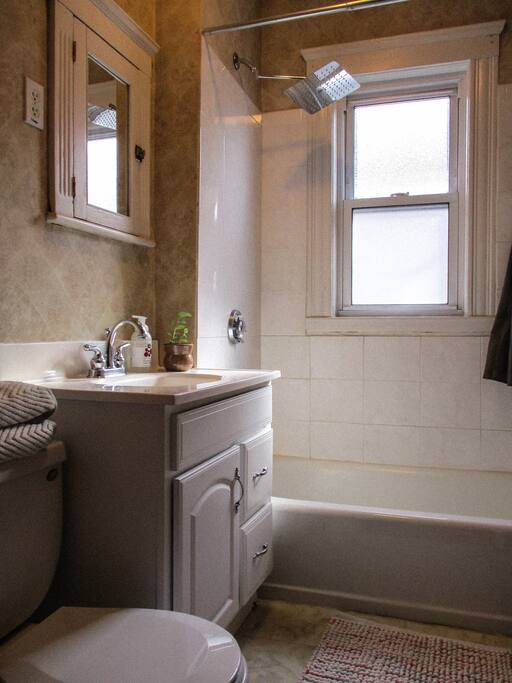 Restroom with tub/shower.