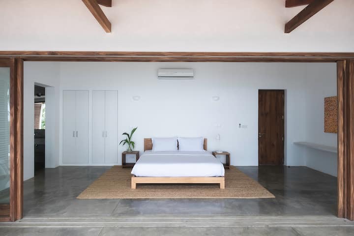 Upstairs master bedroom with private ensuite and large deck