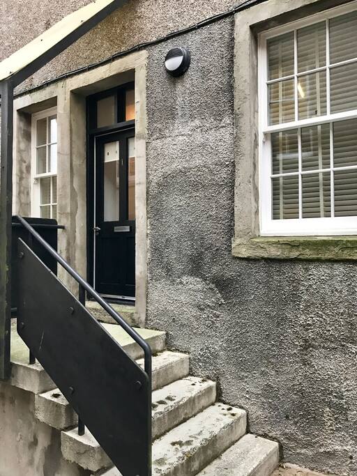 The apartment has its own private door and entrance with canopy.