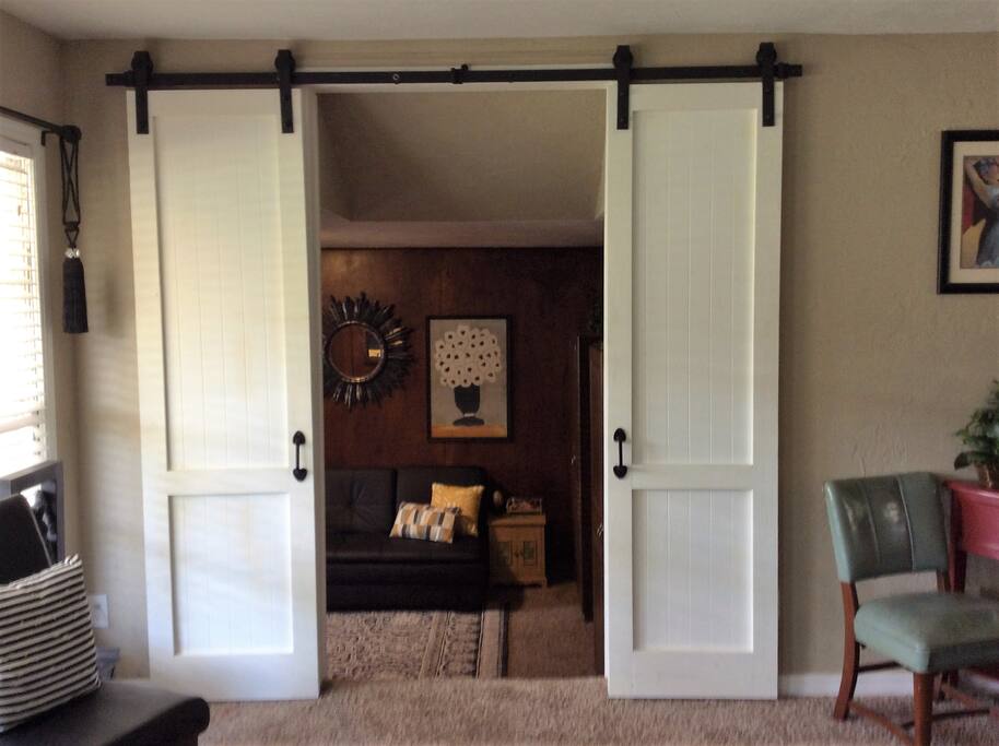 House has sliding barn doors as seen on HGTV.