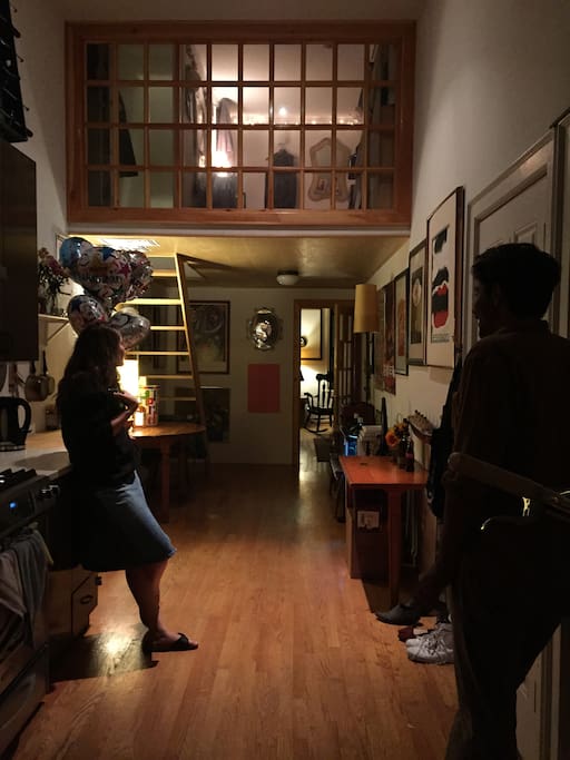 You can see the bedroom tucked away above dining area!