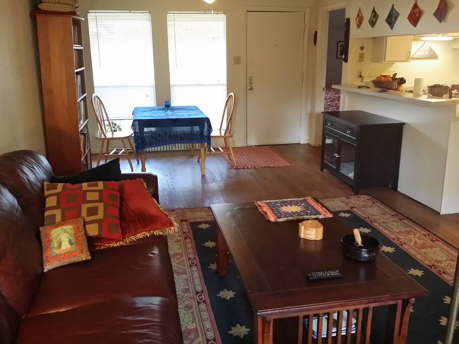Living room toward dining area, east