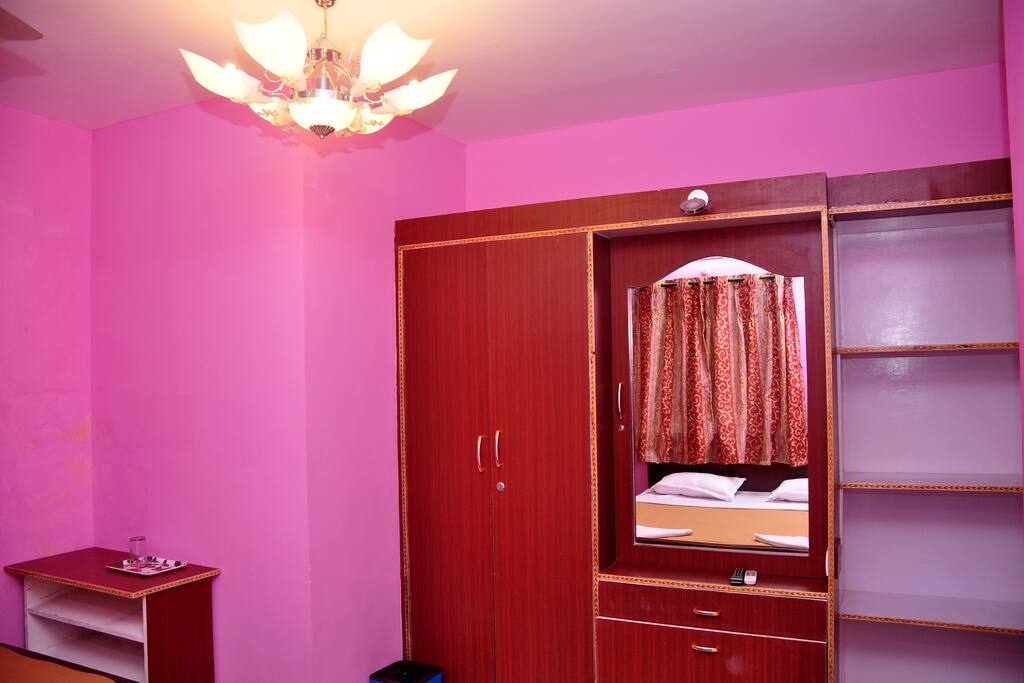 Well furnished room with TV