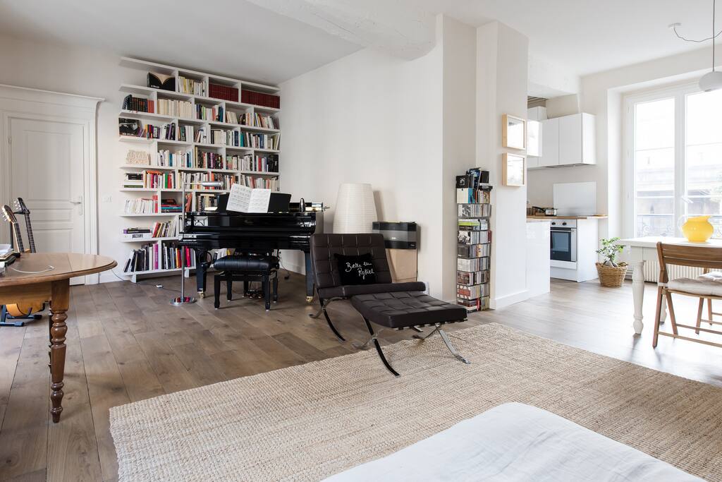 Large living room with grand piano