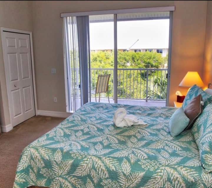 The master boasts a king bed, TV,  en-suite, and WATER VIEW terrace.