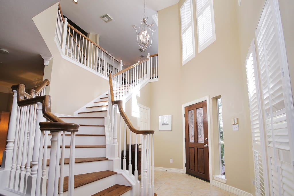 The three story foyer is open and grand.