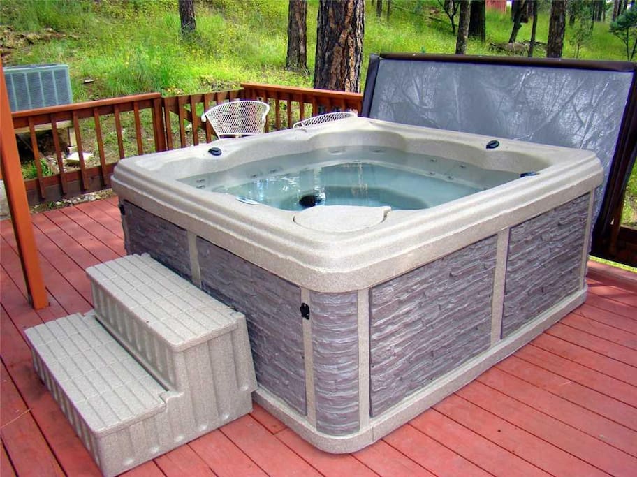 Private Hot Tub- The hot tub is ready, and you will love the privacy and convenience of having your family hideaway.