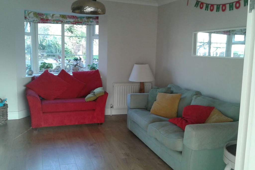 Cosy lounge with wood burning stove and TV - Netflix & Showbox for a Movie night