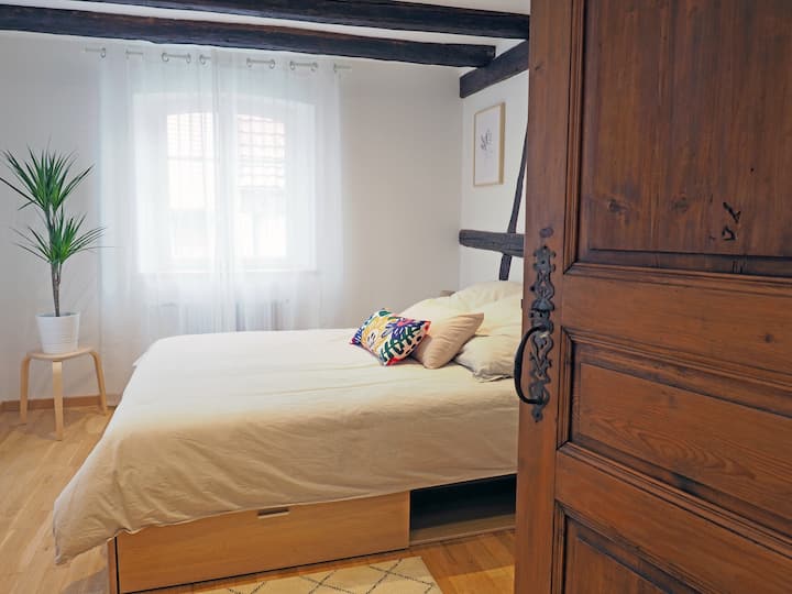 Bedroom on the 1st floor with a queen bed