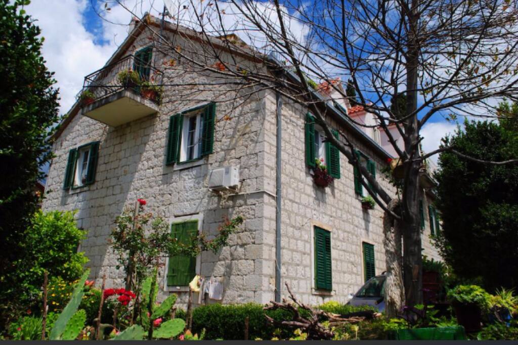 Our apartment is in the ground floor. The house was built in 1901. It is traditional old stone house that is situated in Kastel Gomilica(between Split and Trogir).