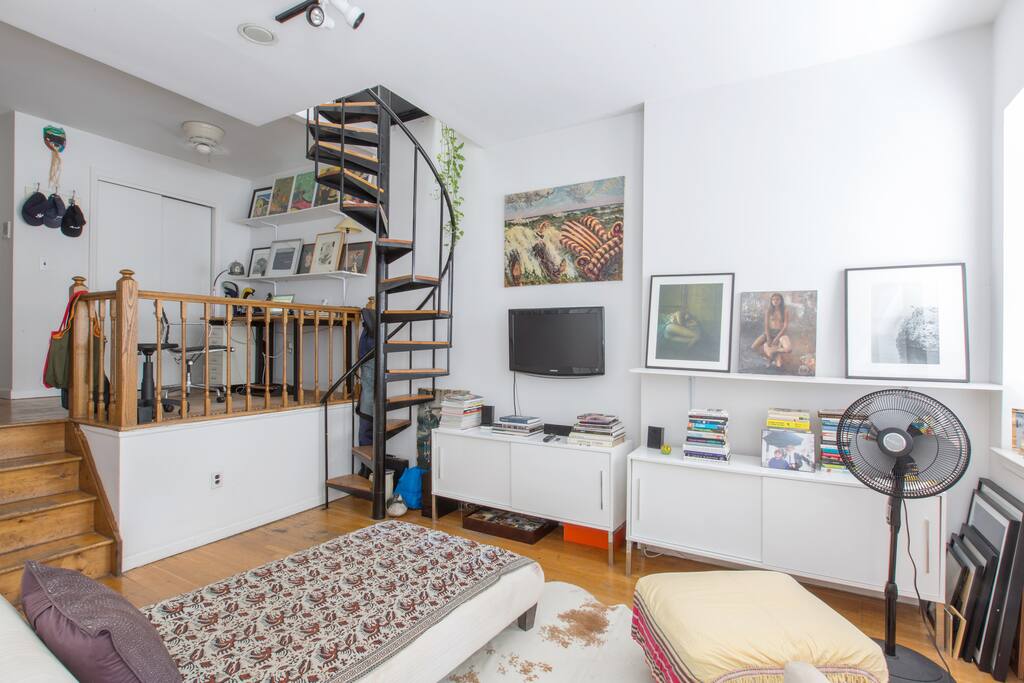 View of the office and spiral staircase from living room
