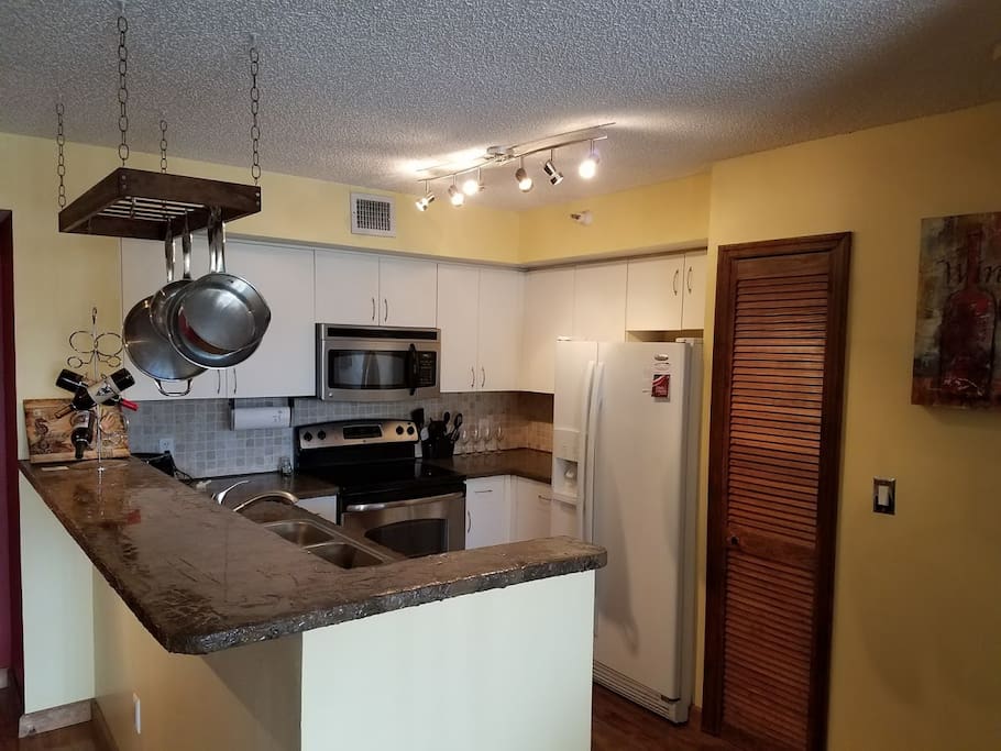 Fully equipped kitchen complete with all appliances, utensils, dishes and more.
