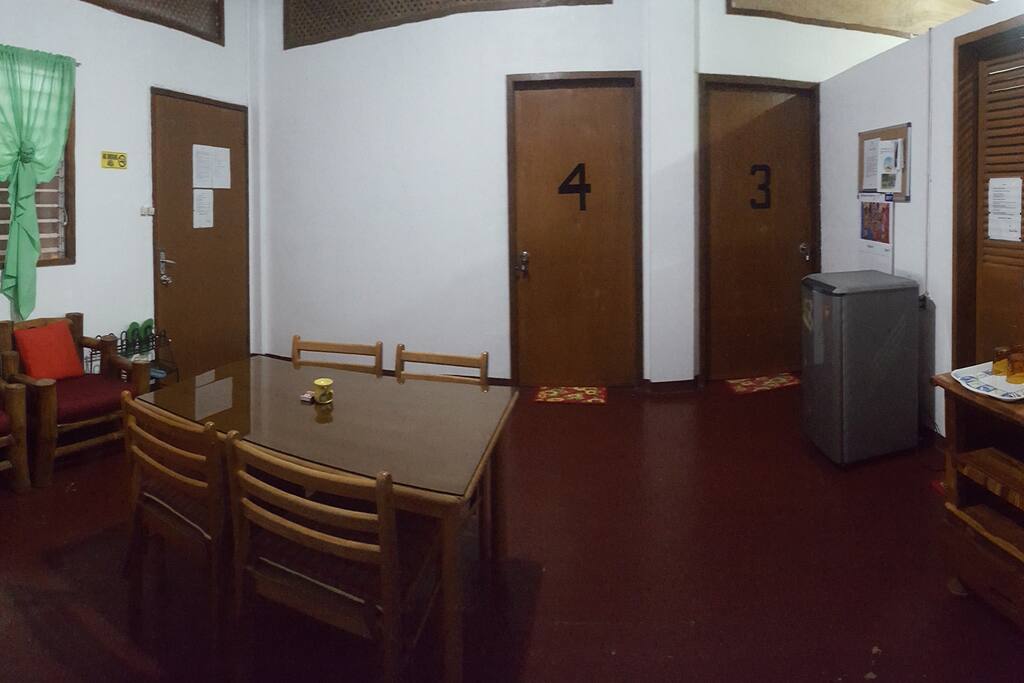 Shared dining area with Refrigerator, Free Drinking Water and rubber slippers for inside the house only.
