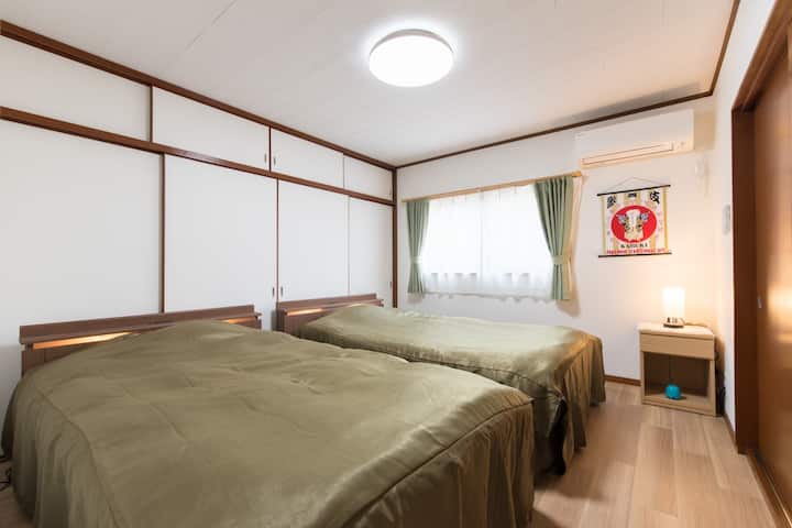 ベットルーム（竹）
所有床均为半双人床（宽：122厘米×长：210厘米），提供充足的空间，让您舒适休息。