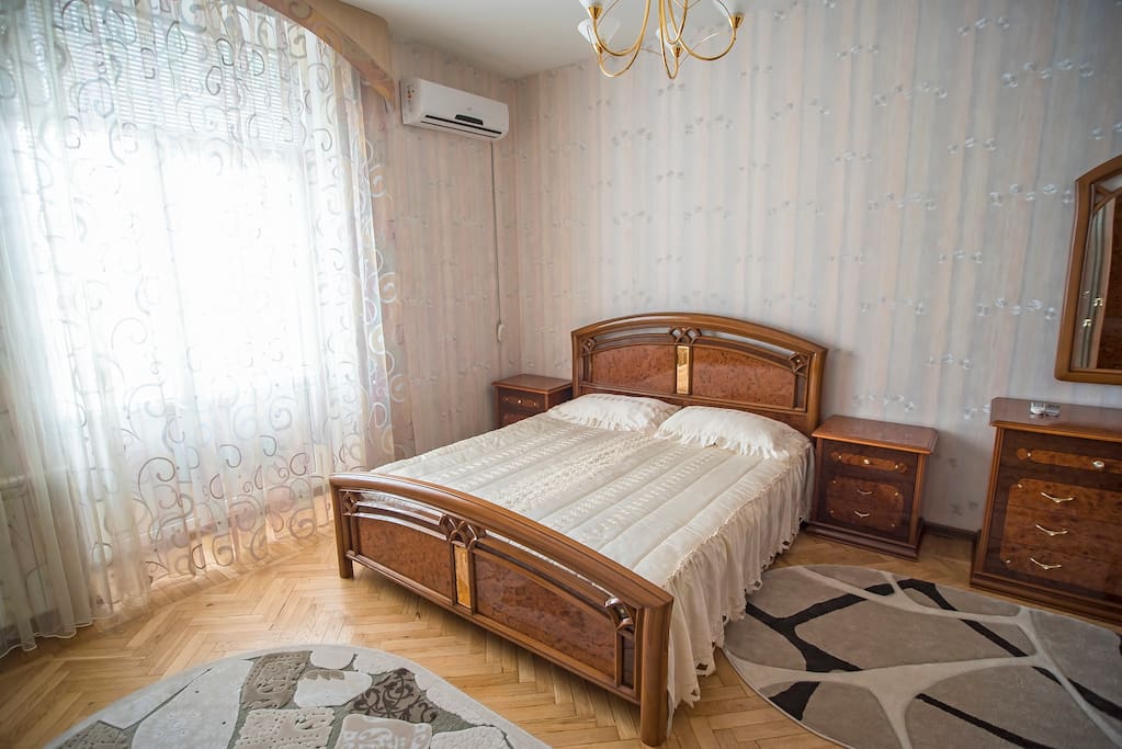 Bedroom with balcony and A/C