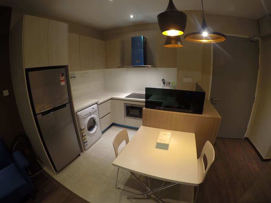 Dining table and kitchen! Ou, there's a washing machine too.
Please check out my 2nd unit if 1.0 are not available: https://www.airbnb.com/rooms/18066307
