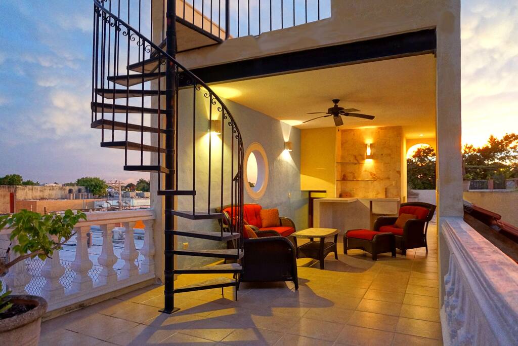 3rd floor covered terrace and stairs to 4th floor lookout.