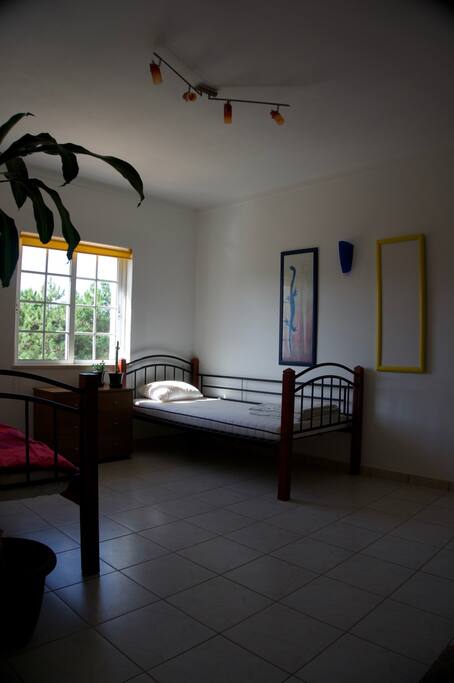 Shared bedroom with 2 single beds