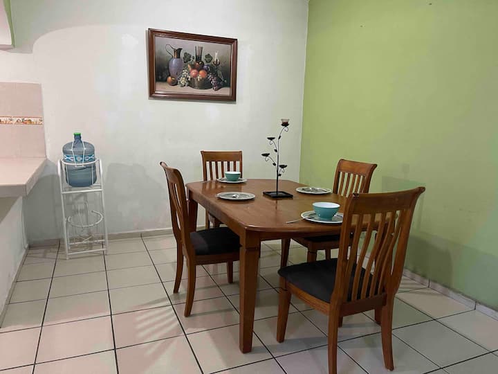 Full house c/2 bathrooms and 2 bedrooms, carport.