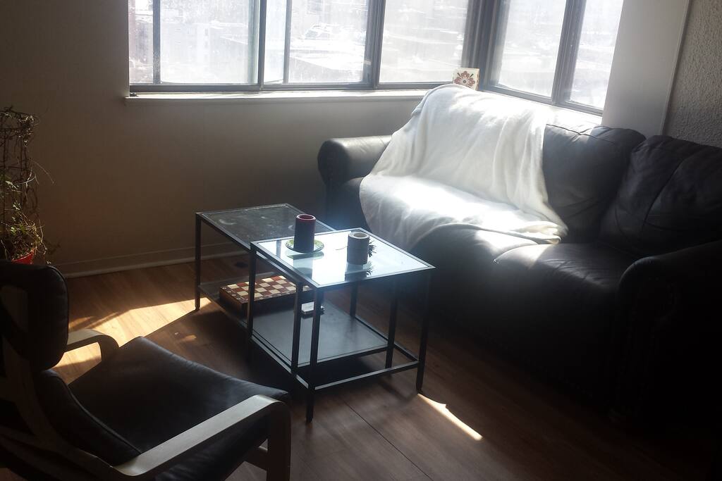 Living room with Montreal's view on the background
