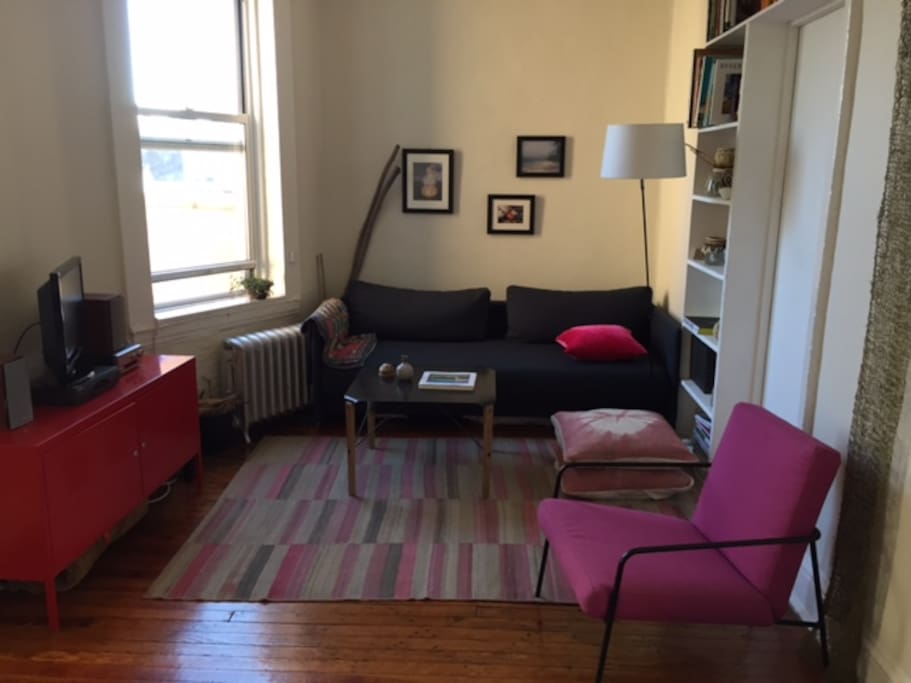 this is the living room area - a great place to unwind , read or watch TV -