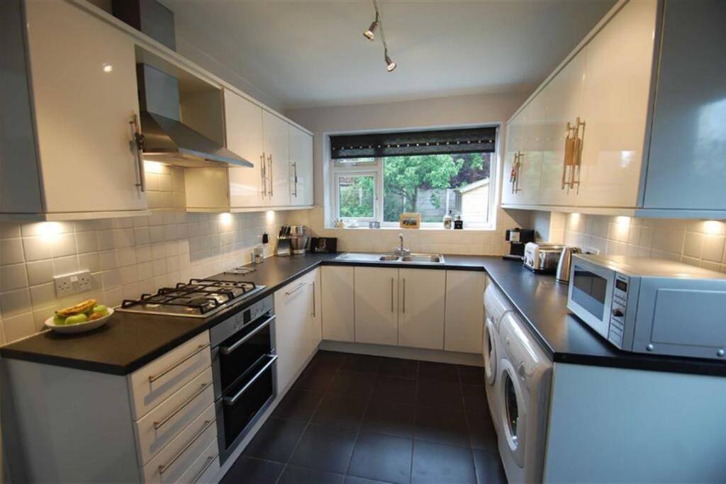 Kitchen with Dishwasher, Microwave, Kettle. Toaster, oven and grill