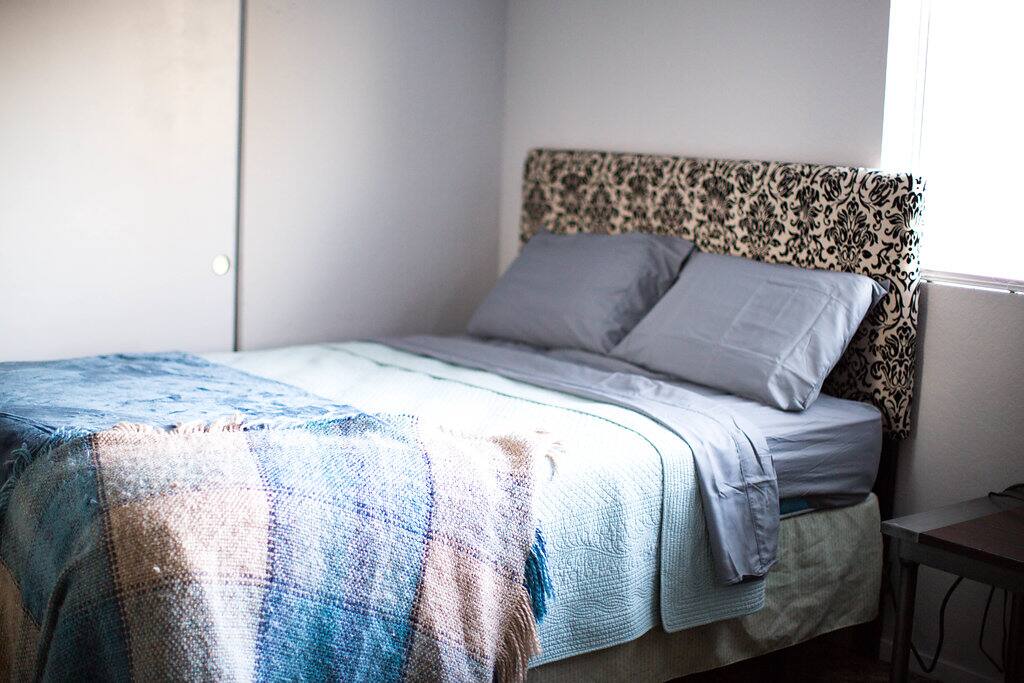 Along with the two queen beds, we have another twin bedframe that rolls out from under this bed. Let us know if you want this option and we can set it up ahead of time.