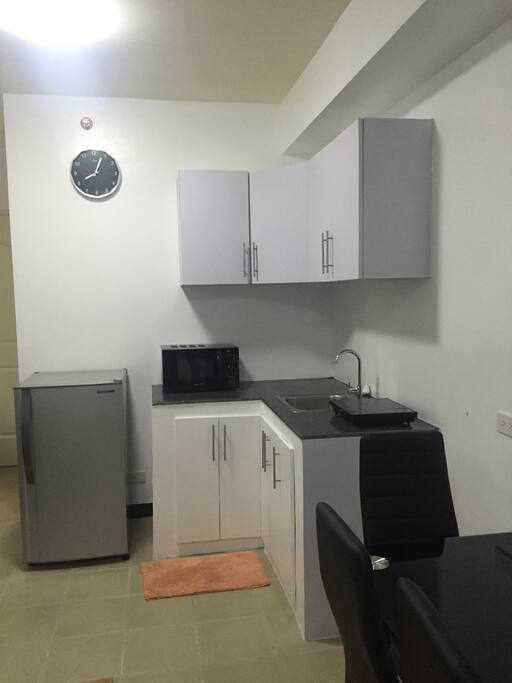 Mini-kitchen with induction cooker, microwave oven and refrigerator