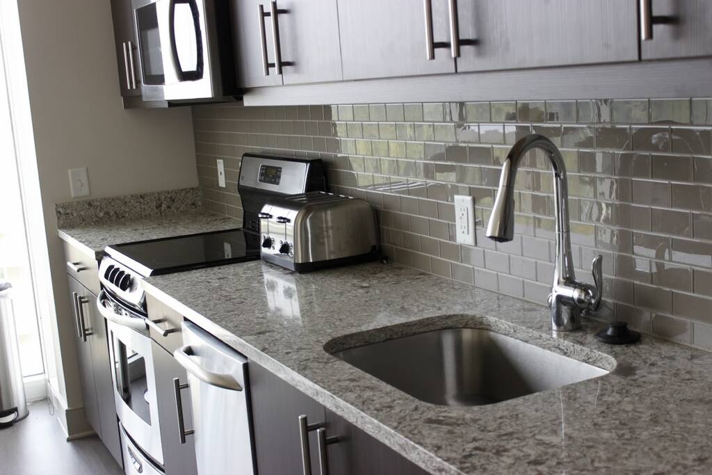 Kitchen Area w/ Granite Countertop
