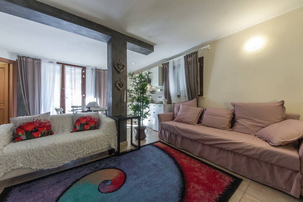 The Living Room with two Sofas. One of them is a comfortable Sofa Bed ideal for two adults!