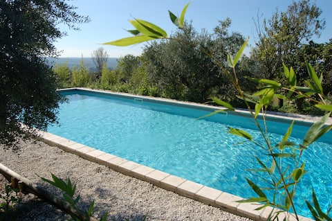 On the hill, surrounded by greenery