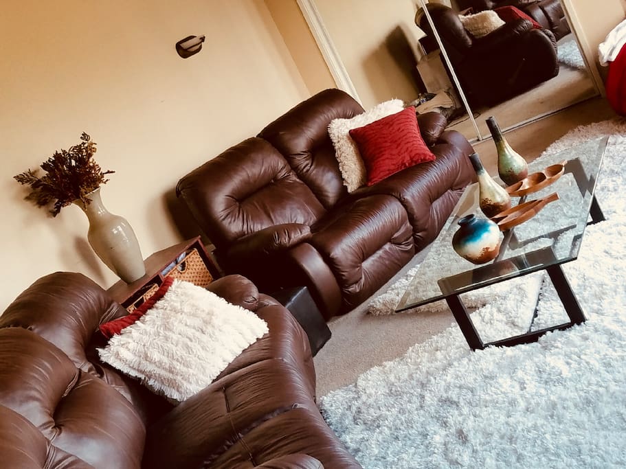 Leather recliners facing Morro Rock