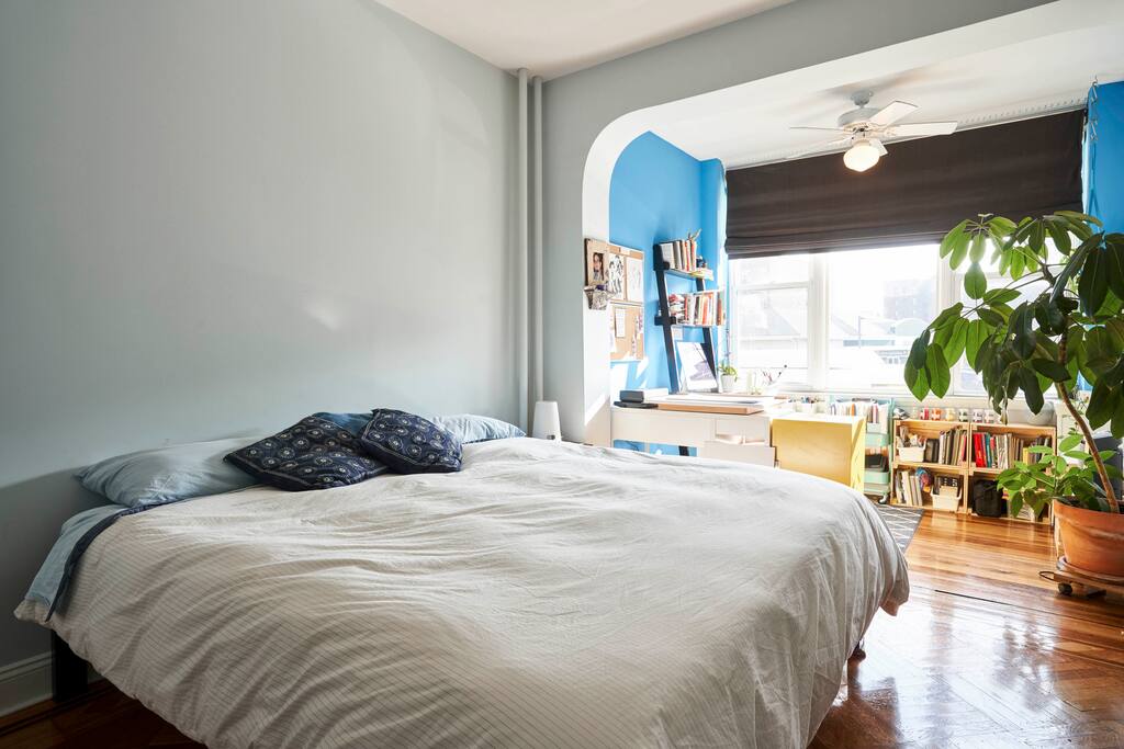 Main bedroom at light-filled work space at the front of the house.