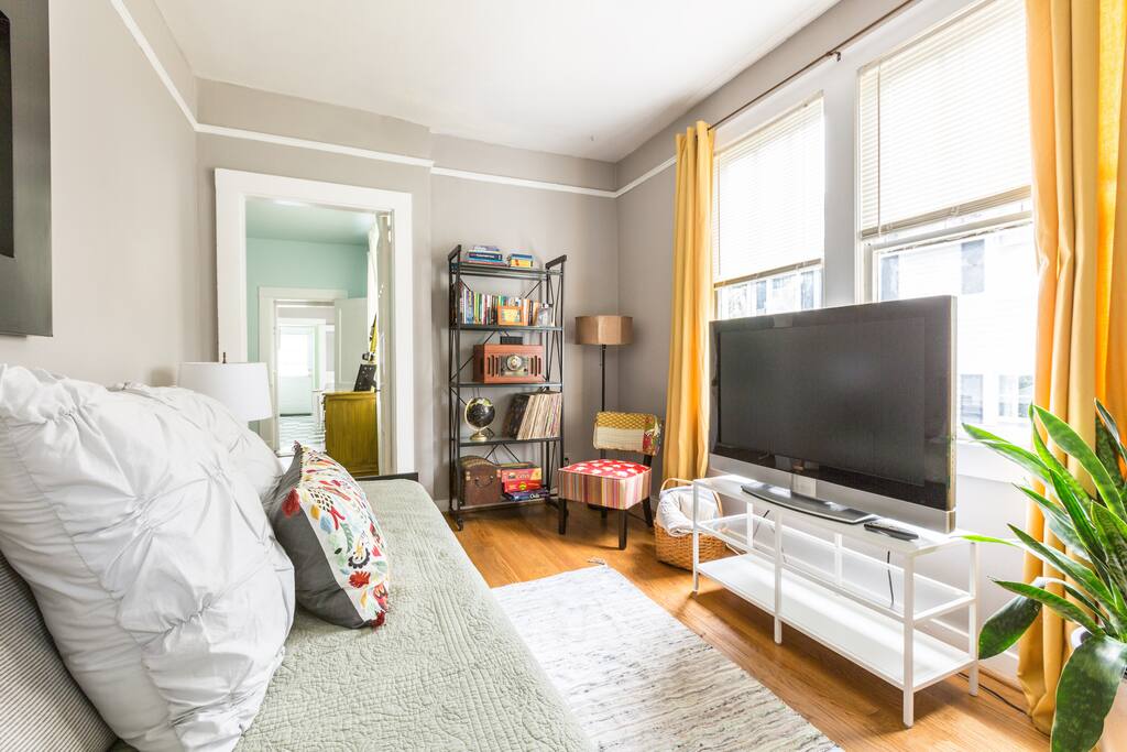 Sunny living room with cable TV and high speed Wifi