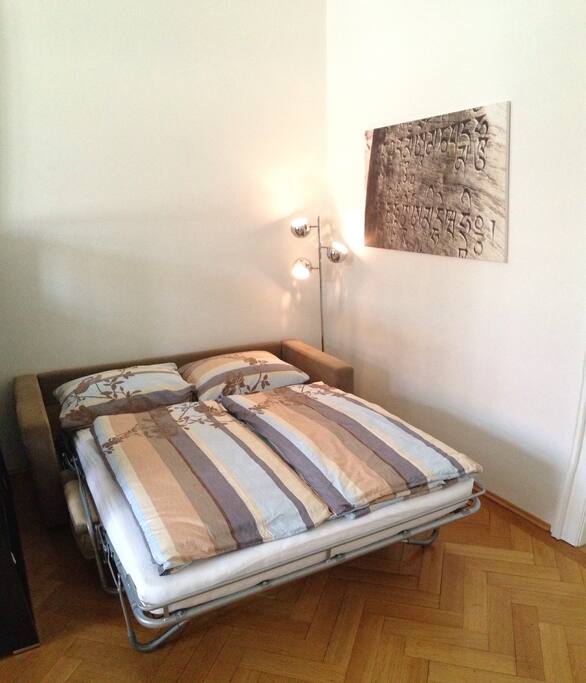 This is how the fold-out couch looks ins sleeping mode with 1,60m mattress