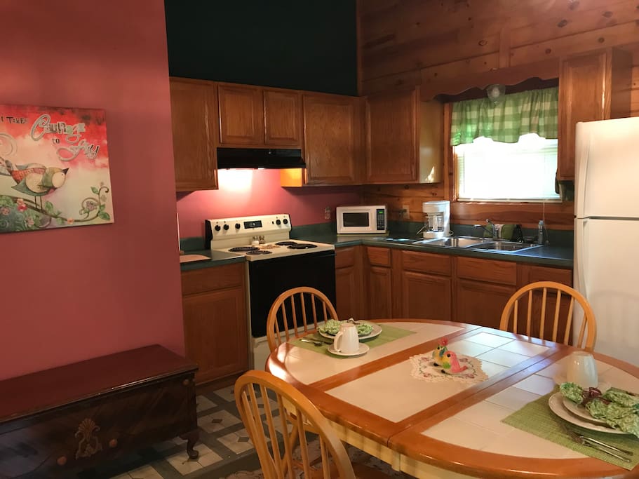Cabin 2, Lifelong Love has a full kitchen, which includes a four burner range, full oven, refrigerator with an ice maker.
Table set romantically for two on arrival.