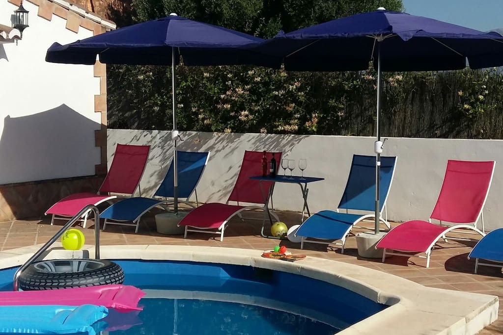 relax around the pool with a bottle of wine or two