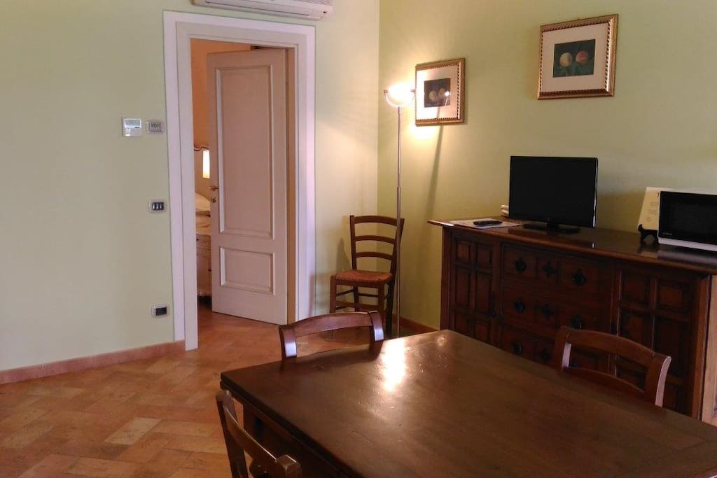 Living room and dining area with microwave