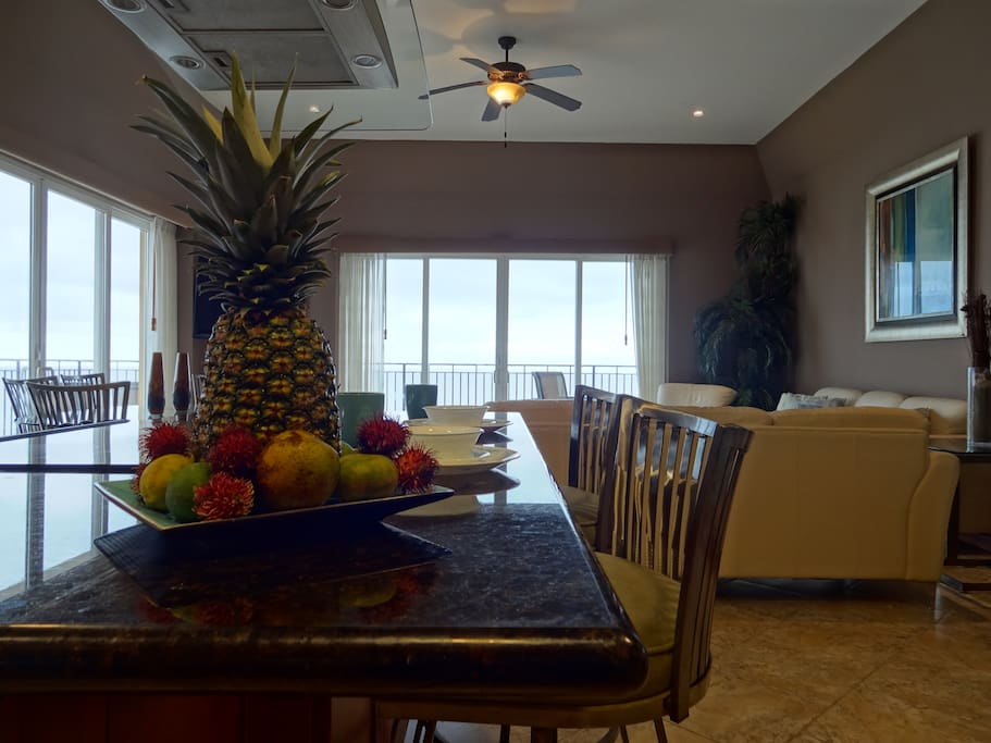 Large gourmet kitchen and large living room with beach views from every window