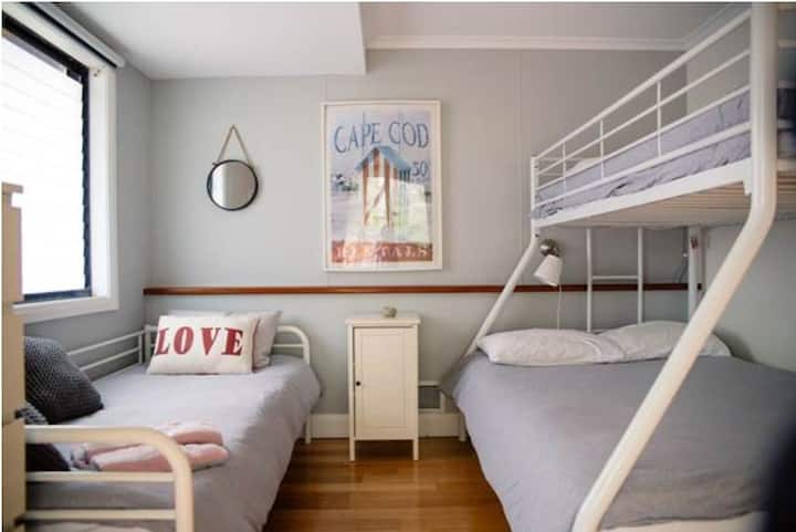 Bedroom 3:  The Kids' Bunk Room - includes one queen and 2 single beds