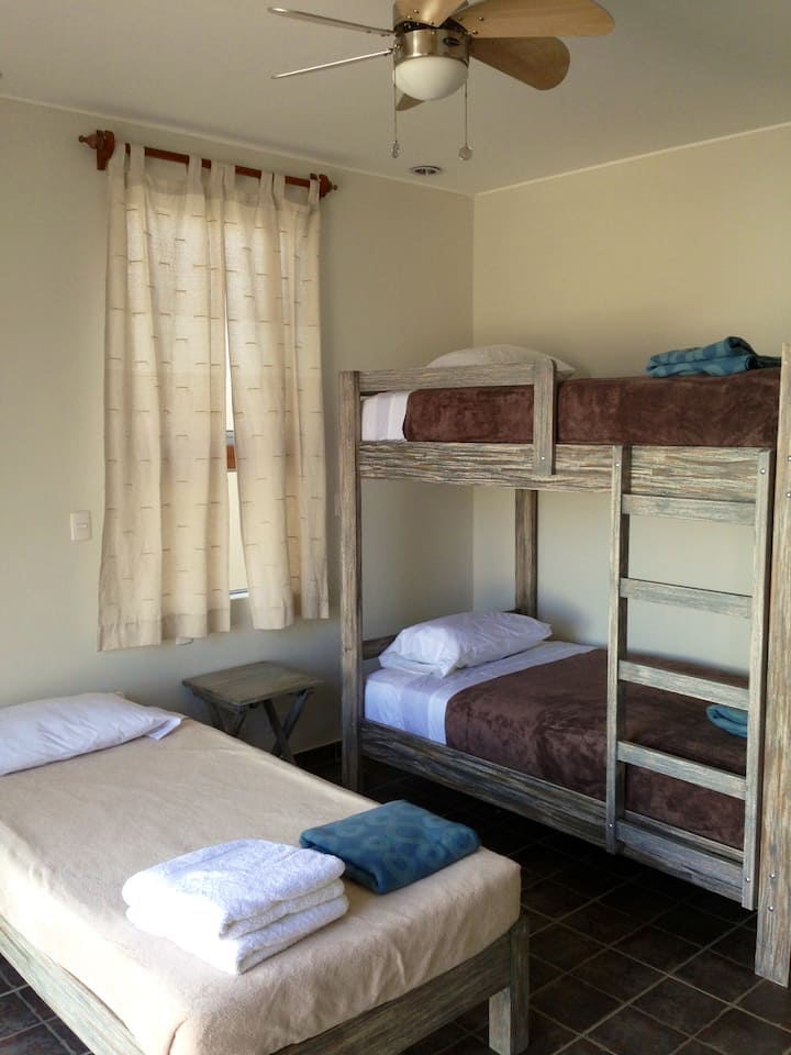 The triple room (with private bathroom and entrance) of the beachsuite. 