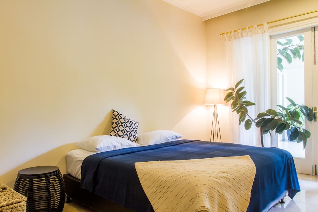 Bright bedroom with direct pool access