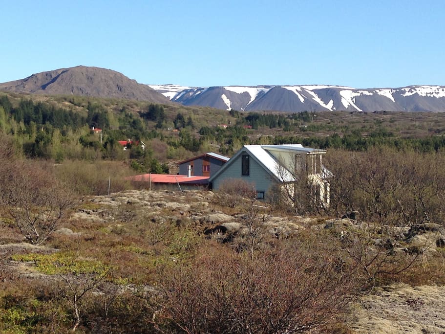 Our house in the nature park. View of the volcano.