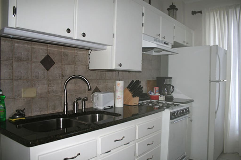 Full kitchen with large pantry.. all utensils.