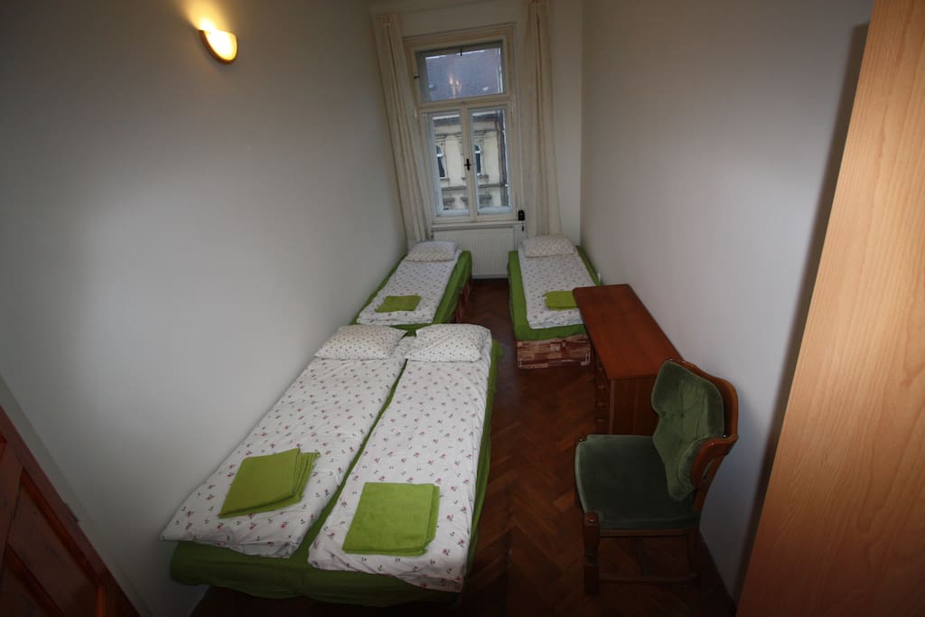 bedroom 43B1 with 2 single beds and settee for 2 pers , aranged for sleeping 4 people