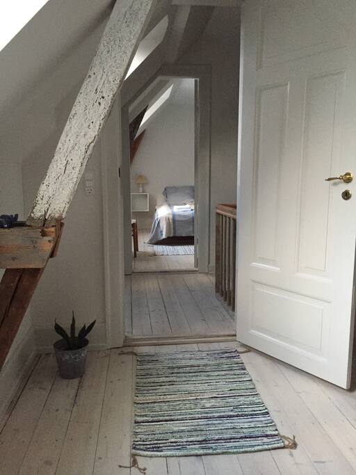View from the livingroom to one of the bedrooms.