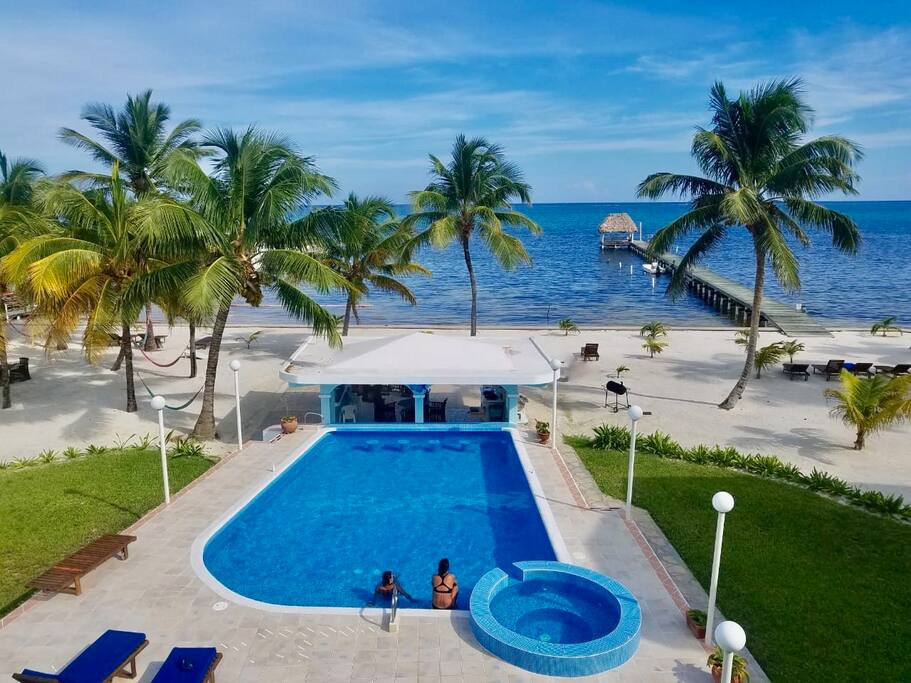 Fresh water pool with cool water bubbler & “bar stools”, plus covered dining/grill area!