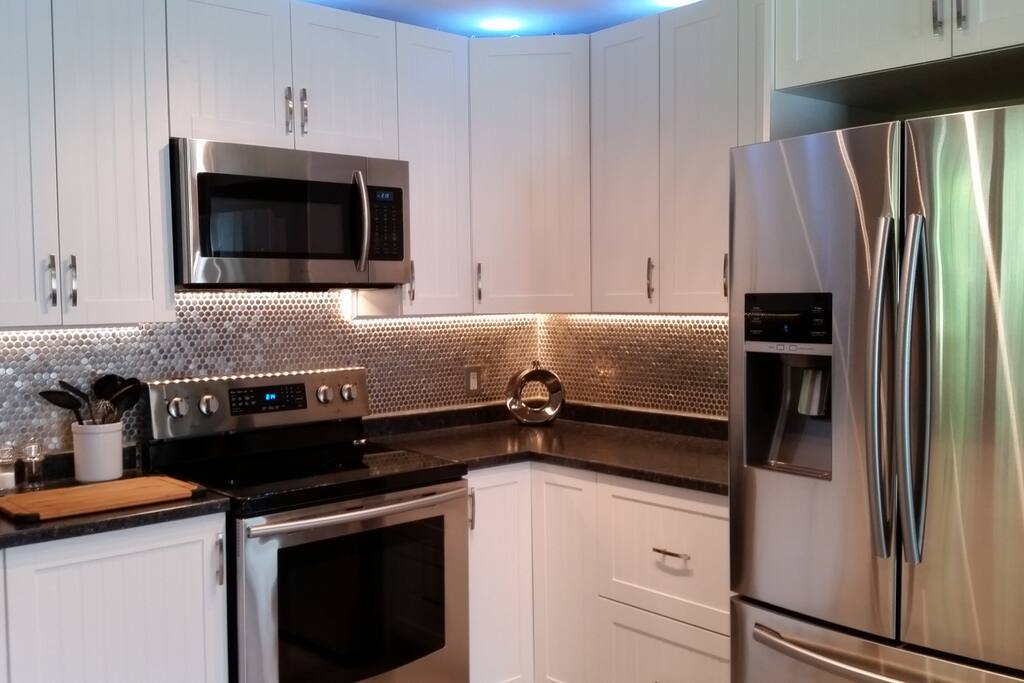 All Brand New Stainless steel appliances. Water and Ice in Door of Fridge.